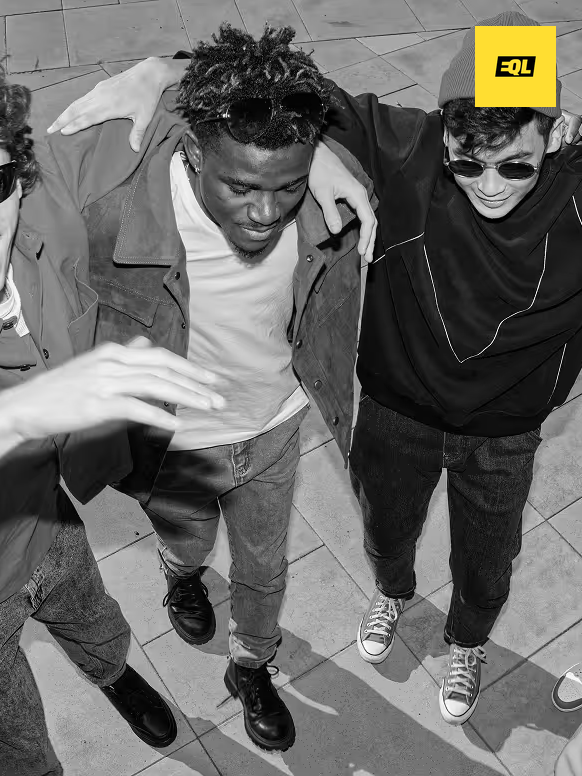 EQL logo over an overhead shot of four friends walking